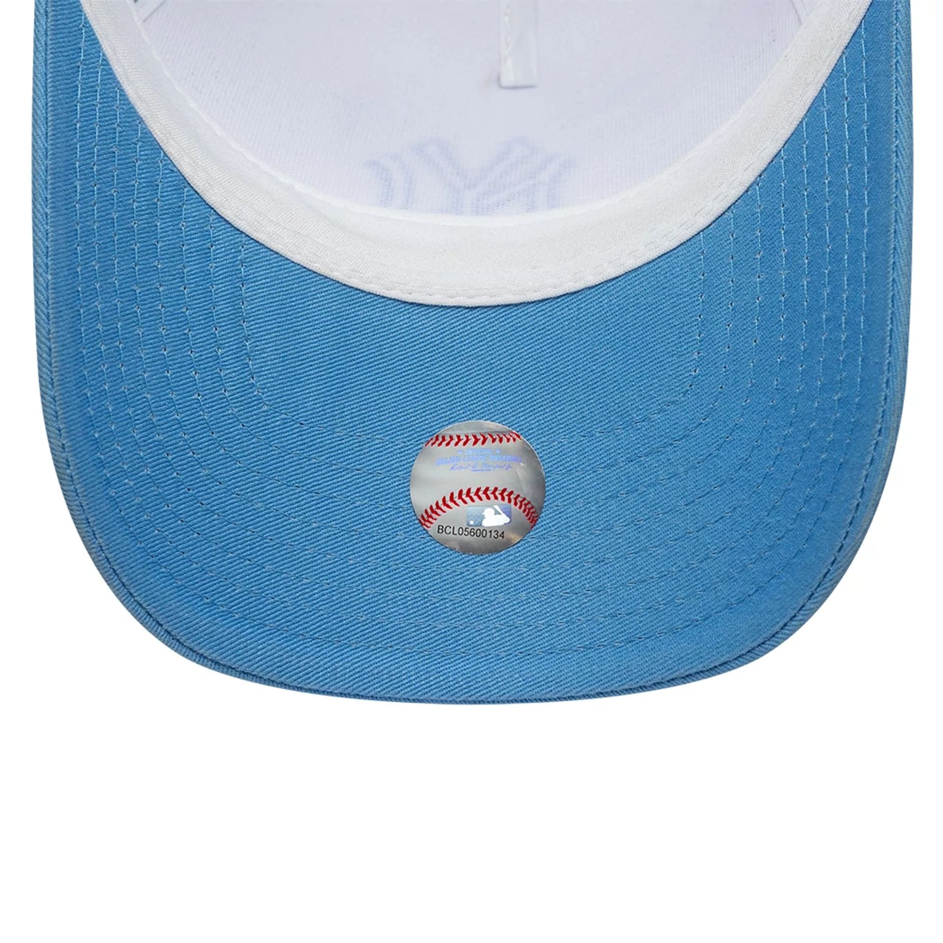 Pictured is this MLB League Essential New York Yankees 9FORTY A-Frame Trucker cap in pastel blue. 5