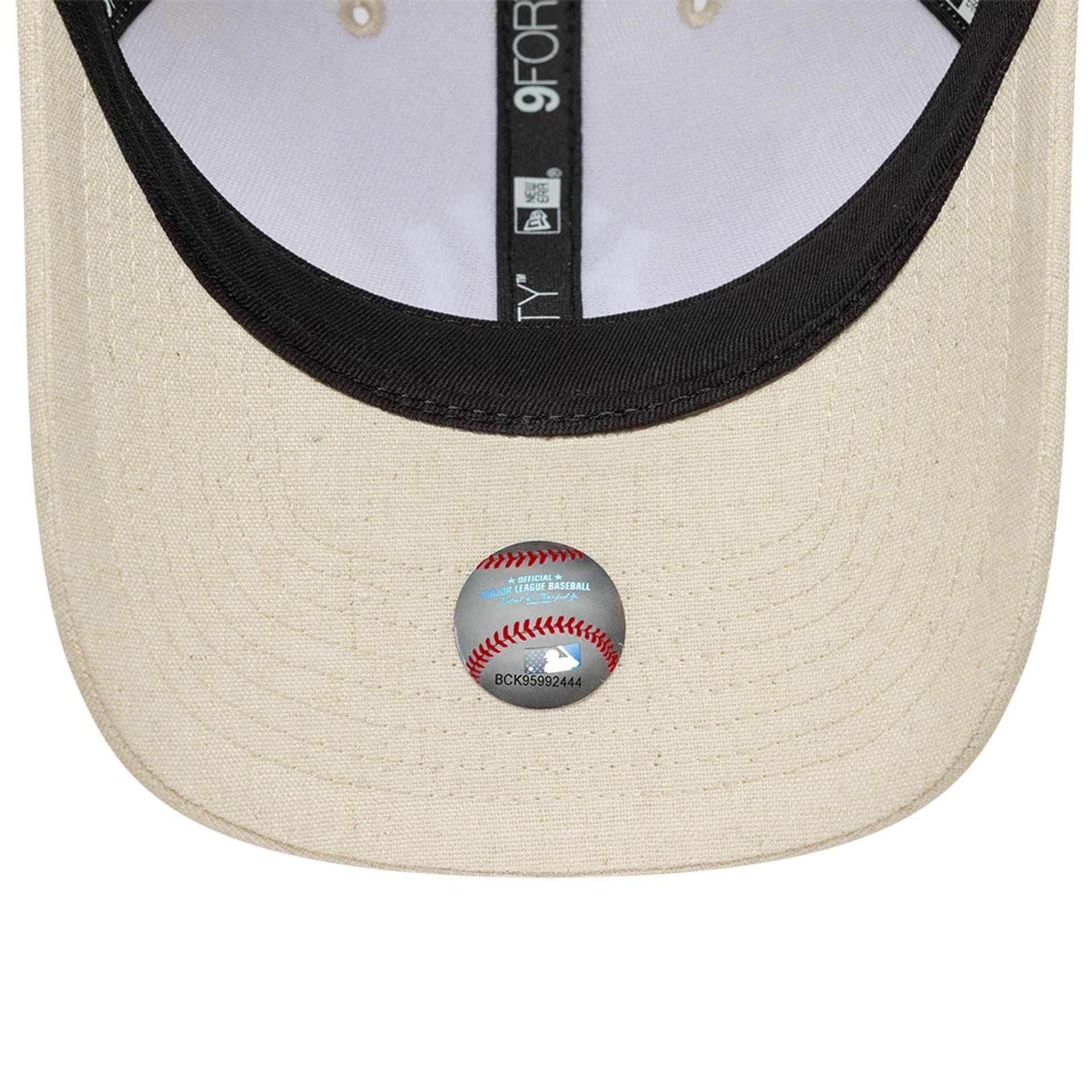 Pictured is this MLB Linen New York Yankees 9FORTY M-Crown cap in Cream. 5