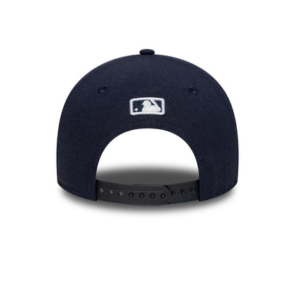 New York Yankees MLB Linen Navy New Era 9FORTY M-Crown Adjustable Cap, rear view showing the white embroidered MLB Batterman logo centred on the navy crown, with a black adjustable snap closure and matching navy fabric eyelets.