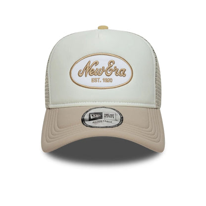 Pictured is this New Era Oval Patch 9FORTY A-Frame Trucker cap in Beige. 2