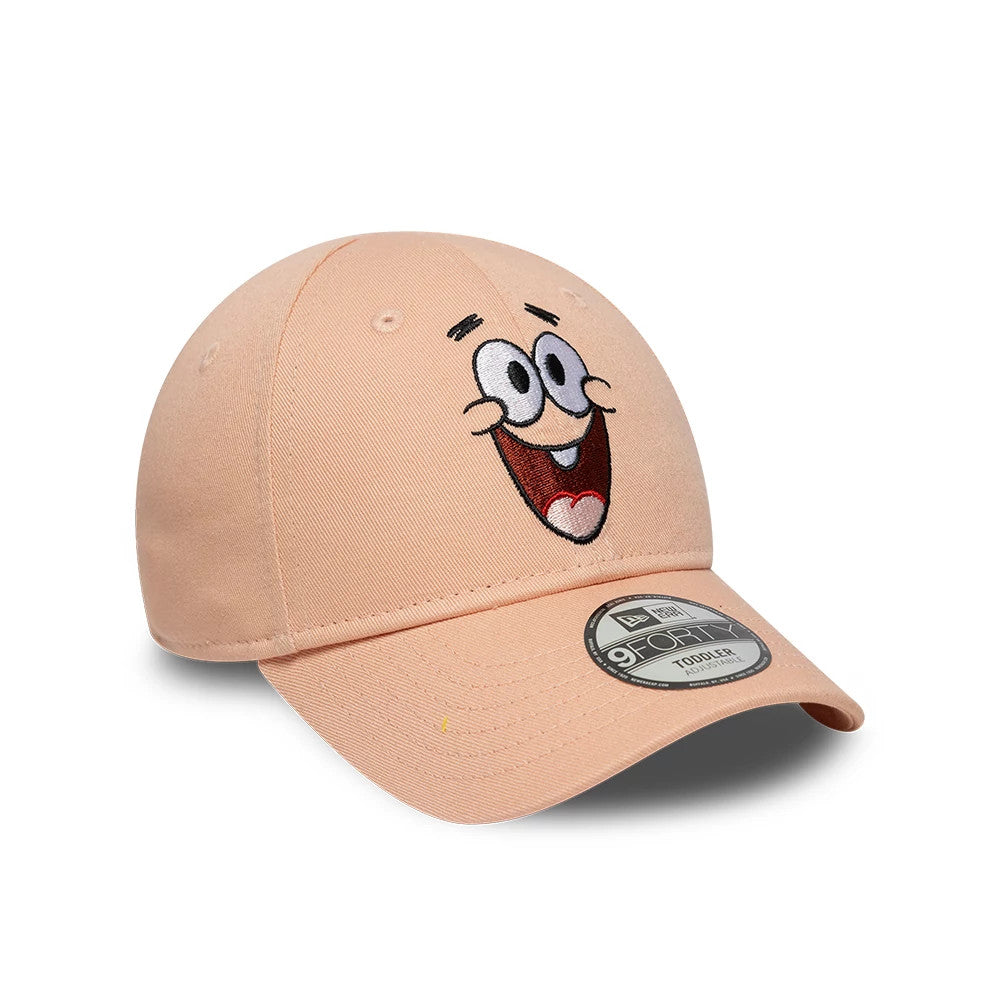 Patrick Star Toddler Spongebob Pastel Pink New Era 9FORTY Adjustable Cap, three-quarter view showing the embroidered Patrick Star face on the front panel, pastel pink curved visor with 9FORTY size sticker, and matching top button and eyelets.