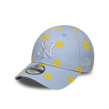 New York Yankees Toddler MLB Summer Pastel Blue New Era 9FORTY Adjustable Cap, front view showing a white embroidered NY logo on a light blue crown with yellow sun pattern, featuring a 9FORTY size sticker on the curved visor.