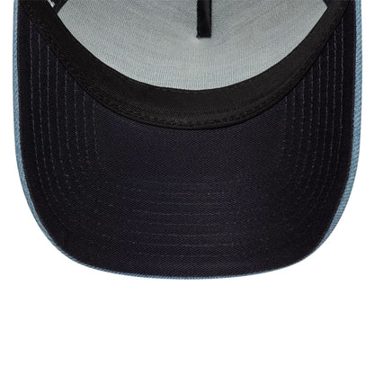 Pictured is this New Era Leather Patch Denim 9FORTY A-Frame Trucker cap in navy. 5