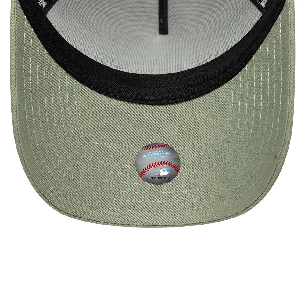 Pictured is this MLB Outline LA Dodgers 9FORTY E-Frame Trucker cap in pastel green. 5