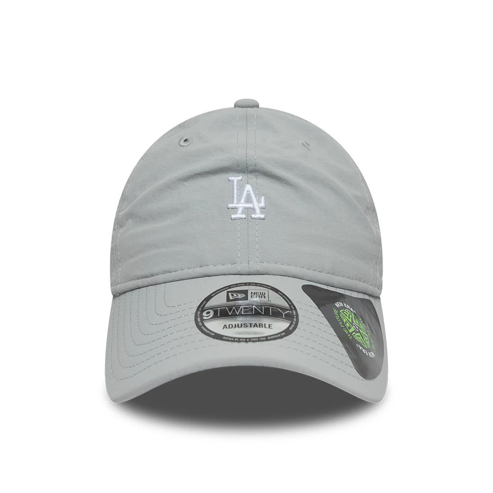 LA Dodgers MLB Recycled Grey New Era 9TWENTY Adjustable Cap, front view showcasing white LA logo in flat embroidery on the unstructured grey crown, with grey curved visor featuring the 9TWENTY size sticker and additional recycled materials sticker.