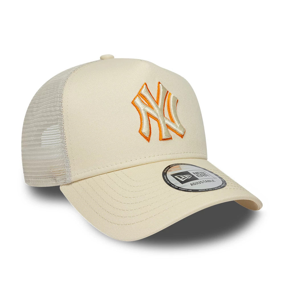 New York Yankees MLB Outline Cream New Era 9FORTY E-Frame Trucker Adjustable Cap, three-quarter view showing the raised NY logo in cream with orange outline embroidery on the front panel, cream curved visor and New Era 9FORTY size sticker.