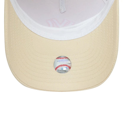 Pictured is this MLB Outline New York Yankees 9FORTY E-Frame Trucker cap in cream. 5