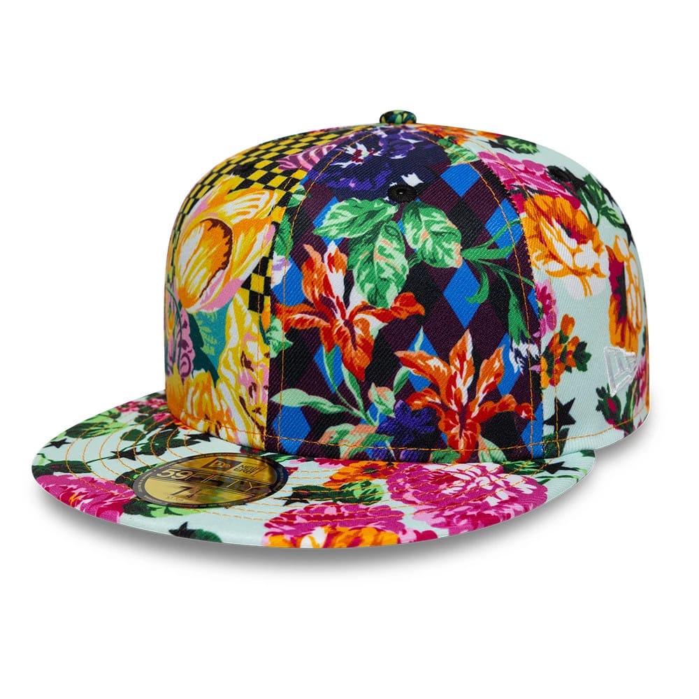 Pictured is this Kenzo X New Era Flowers 59FIFTY Fitted cap in white. 1
