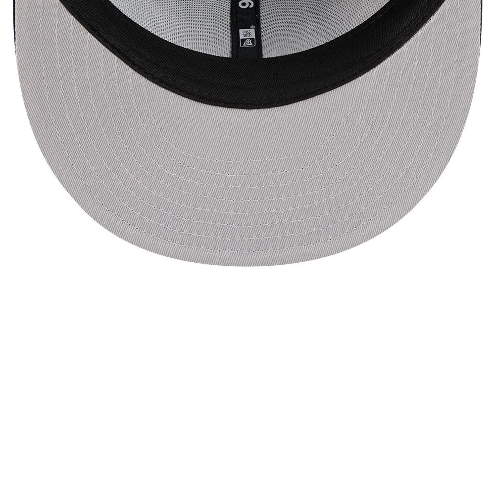 New York Knicks NBA Hardwood Classic ASG Blue New Era 9FIFTY Snapback Adjustable Cap, inside view showing the grey undervisor, black sweatband with printed stitching, and part of the black taping along the centre seam.