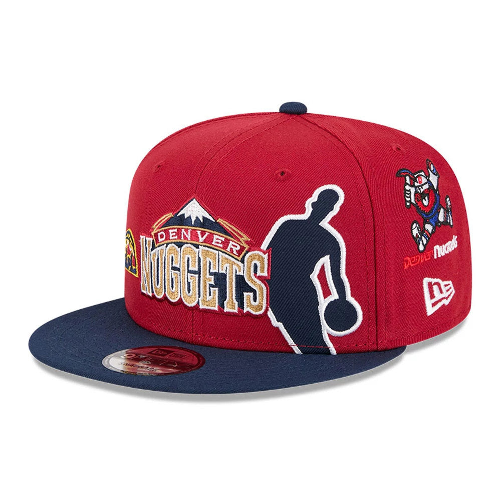 Nuggets NBA Hardwood Classic ASG Dark Red New Era 9FIFTY Snapback Adjustable Cap, front view showing the embroidered Denver Nuggets mountain logo with a basketball player silhouette and multicoloured graphics, navy flat visor.