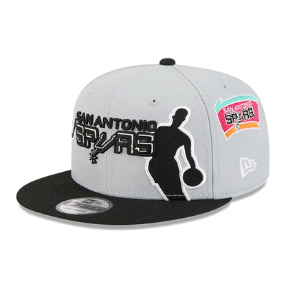 Pictured is this NBA Hardwood Classic All Star Game San Antonio Spurs 9FIFTY Snapback cap in grey. 1