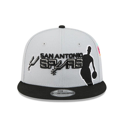 Pictured is this NBA Hardwood Classic All Star Game San Antonio Spurs 9FIFTY Snapback cap in grey. 3