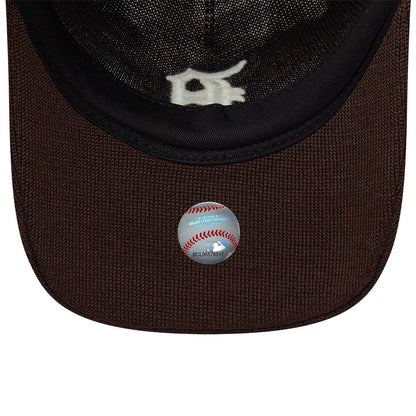 Detroit Tigers MLB Merino Wool Dark Brown New Era 9TWENTY Adjustable Cap, inside view showing the black sweatband, the dark brown fabric and sticker on the brown undervisor, and the embroidered white D logo on the inner panel.