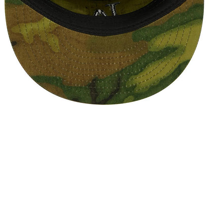 New Era LA Dodgers MLB Ripstop Camo Painter Cap, inside view showing the green and brown camo pattern on the visor, black sweatband along the edge, and white embroidered text on the inner crown fabric.