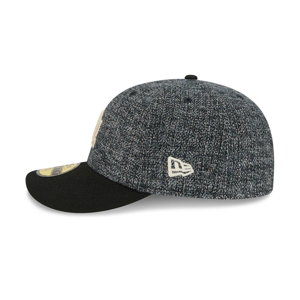 LA Dodgers MLB Tweedy Cotton Black New Era 59FIFTY Fitted Cap, side view showing the embroidered New Era flag logo on the left side of the speckled tweed crown, a black flat visor with a gold 59FIFTY size sticker, and a black top button.