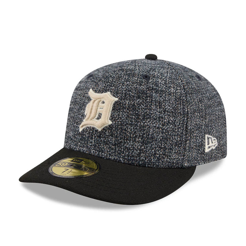 Detroit Tigers MLB Tweedy Cotton Black New Era 59FIFTY Fitted Cap, three-quarter view showing a cream raised embroidered Tigers logo on the front panel, a black flat visor with a gold 59FIFTY size sticker, and a New Era flag logo on the left side.