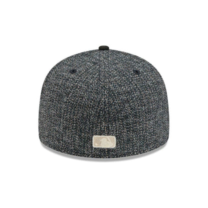 Pictured is this MLB Tweedy Cotton Chicago Cubs 59FIFTY Fitted cap in black. 7