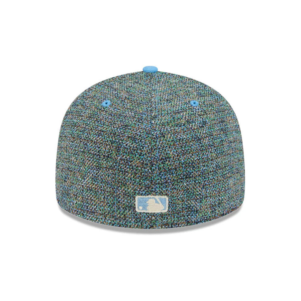 New York Yankees MLB Tweedy Cotton Pastel Blue New Era 59FIFTY Fitted Cap, rear view showing the light blue embroidered MLB Batterman logo at the centre back on a textured tweedy cotton crown, with pastel blue eyelets and top button detail.