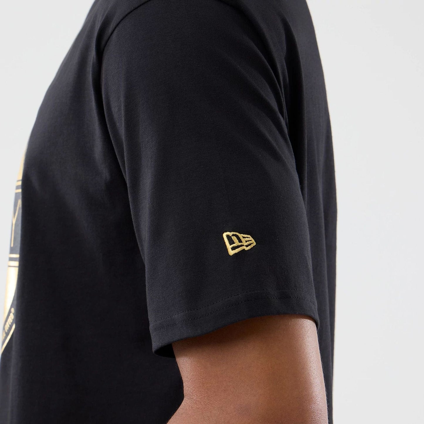 The model is wearing this New Era Sticker Copenhagen Oversized T-Shirt in black. 5