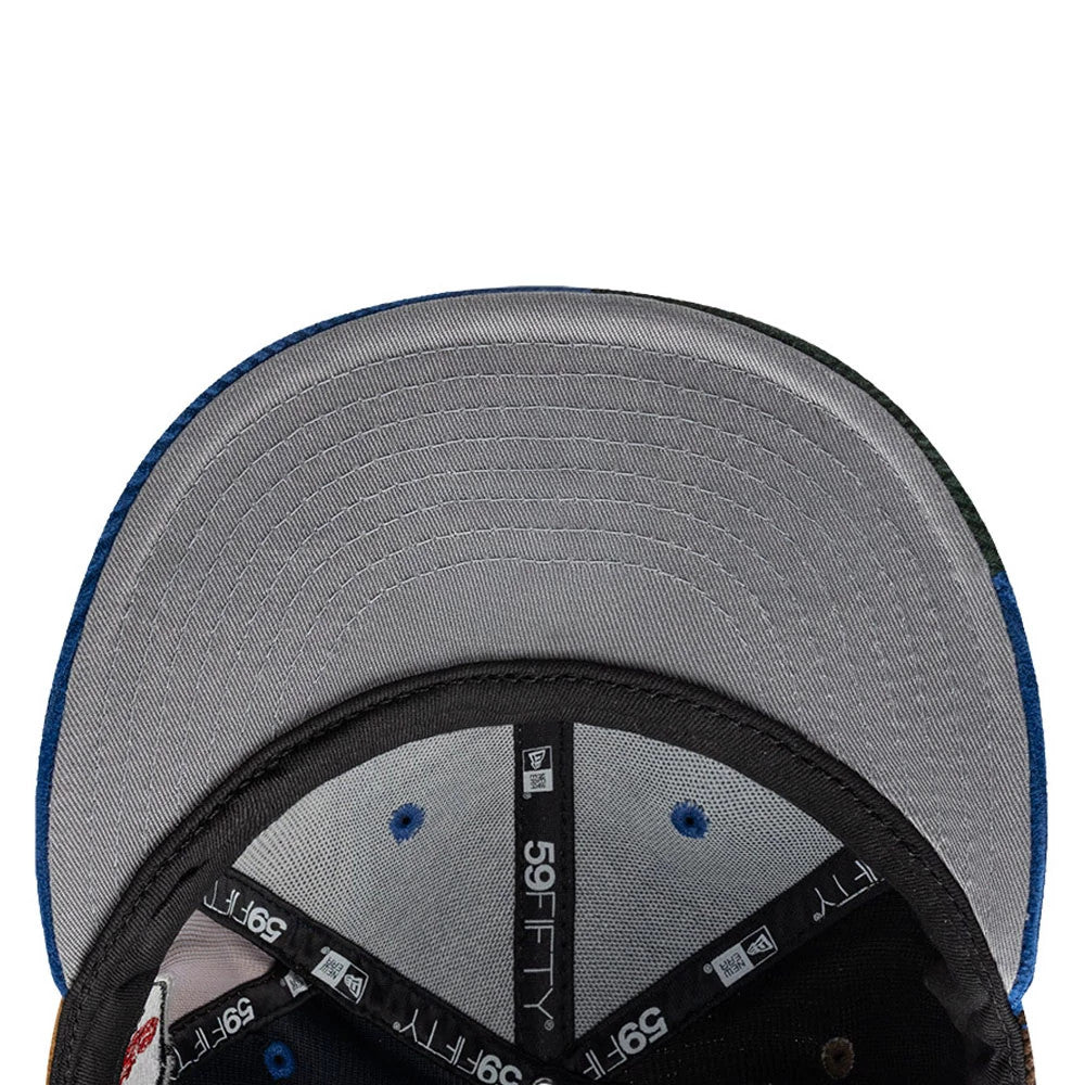 LA Dodgers MLB Patchwork Dark Blue New Era 59FIFTY Fitted Cap, inside view showing the grey undervisor, black sweatband with embroidered New Era branding, and black taping featuring 59FIFTY logos and eyelets on a mesh lining.