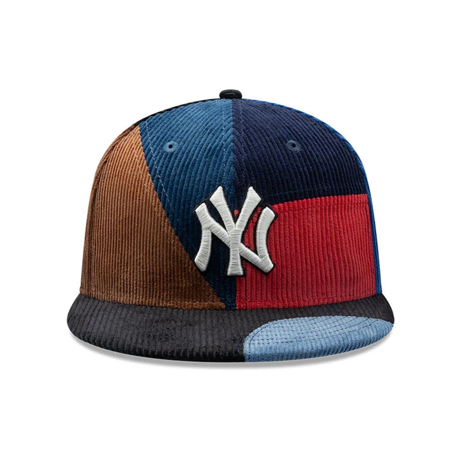 Pictured is this MLB Patchwork New York Yankees 59FIFTY Fitted cap in navy. 3