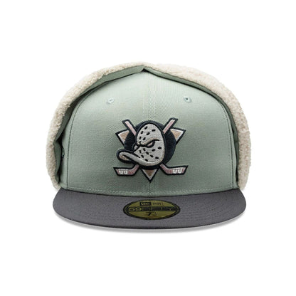 Pictured is this NHL Patch Anaheim Ducks Dogear 59FIFTY Fitted cap in pastel green. 6