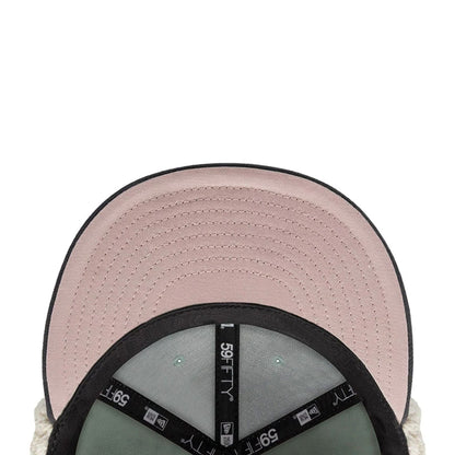 Pictured is this NHL Patch Anaheim Ducks Dogear 59FIFTY Fitted cap in pastel green. 3