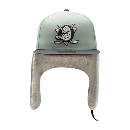 Pictured is this NHL Patch Anaheim Ducks Dogear 59FIFTY Fitted cap in pastel green. 9