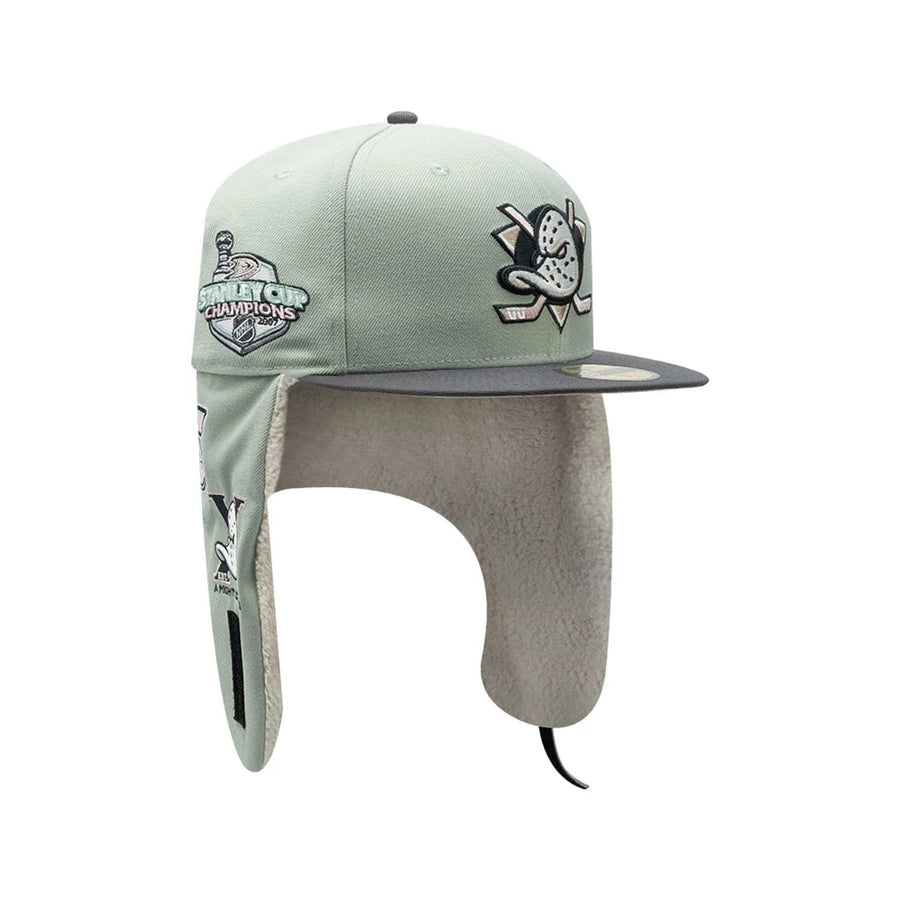 Pictured is this NHL Patch Anaheim Ducks Dogear 59FIFTY Fitted cap in pastel green. 2