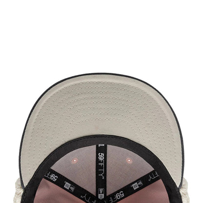 Pictured is this NHL Patch Chicago Blackhawks Dogear 59FIFTY Fitted cap in pastel pink. 10