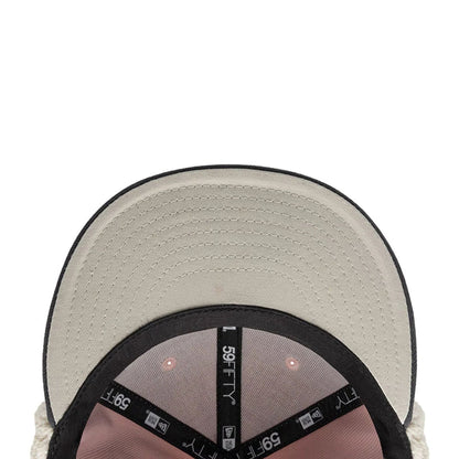 Pictured is this NHL Patch Chicago Blackhawks Dogear 59FIFTY Fitted cap in pastel pink. 10