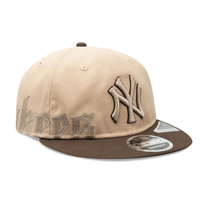 Pictured is this MLB Gothic Script New York Yankees Retro Crown 9FIFTY cap in beige. 1