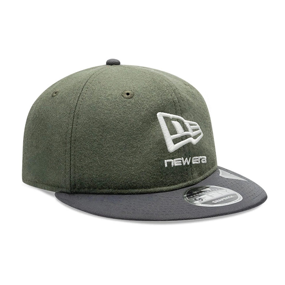 New Era Melton Wool Green Retro Crown 9FIFTY Cap, front view showing raised white New Era logo embroidery on the green crown and a flat grey visor with a 9FIFTY size sticker on top, complemented by a top button.