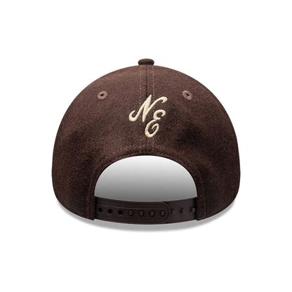 Pictured is this New Era Melton Wool 9FORTY A-Frame cap in Brown. 5