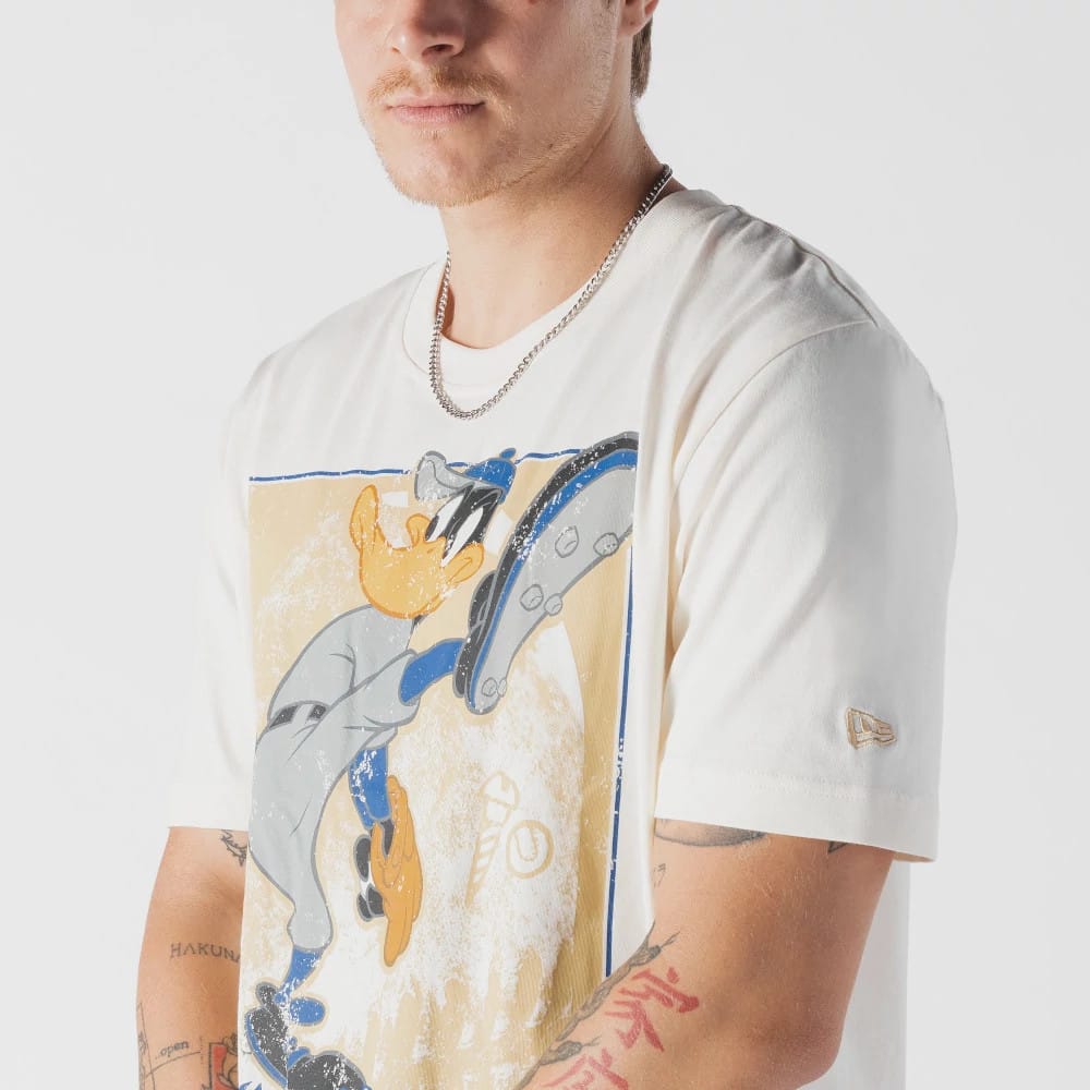 The model is wearing this MLB X Looney Tunes LA Dodgers T-Shirt in Cream. 4