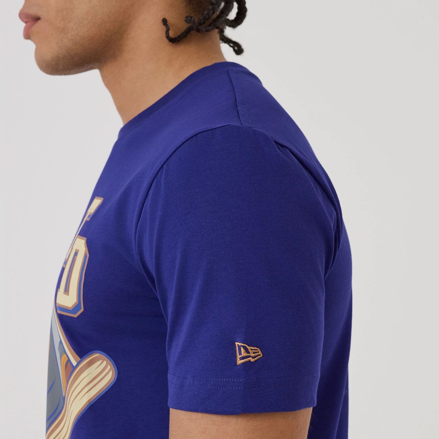 The model is wearing this MLB X Looney Tunes LA Dodgers T-Shirt in dark blue. 5