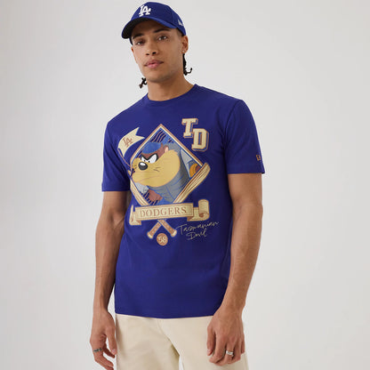 The model is wearing this MLB X Looney Tunes LA Dodgers T-Shirt in dark blue. 1