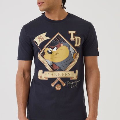 The model is wearing this MLB X Looney Tunes New York Yankees T-Shirt in navy. 4