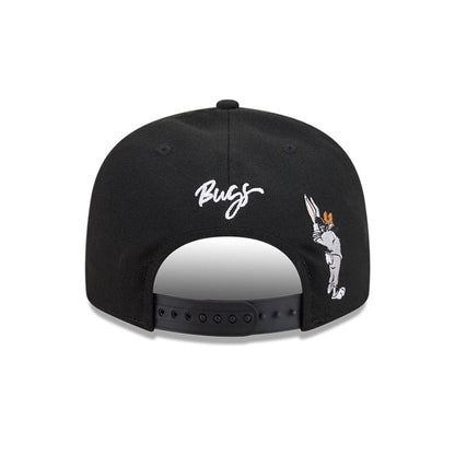 Pictured is this MiLB X Looney Tunes Bugs Bunny El Paso Chihuahuas 9FIFTY Snapback Adjustable cap in black. 5