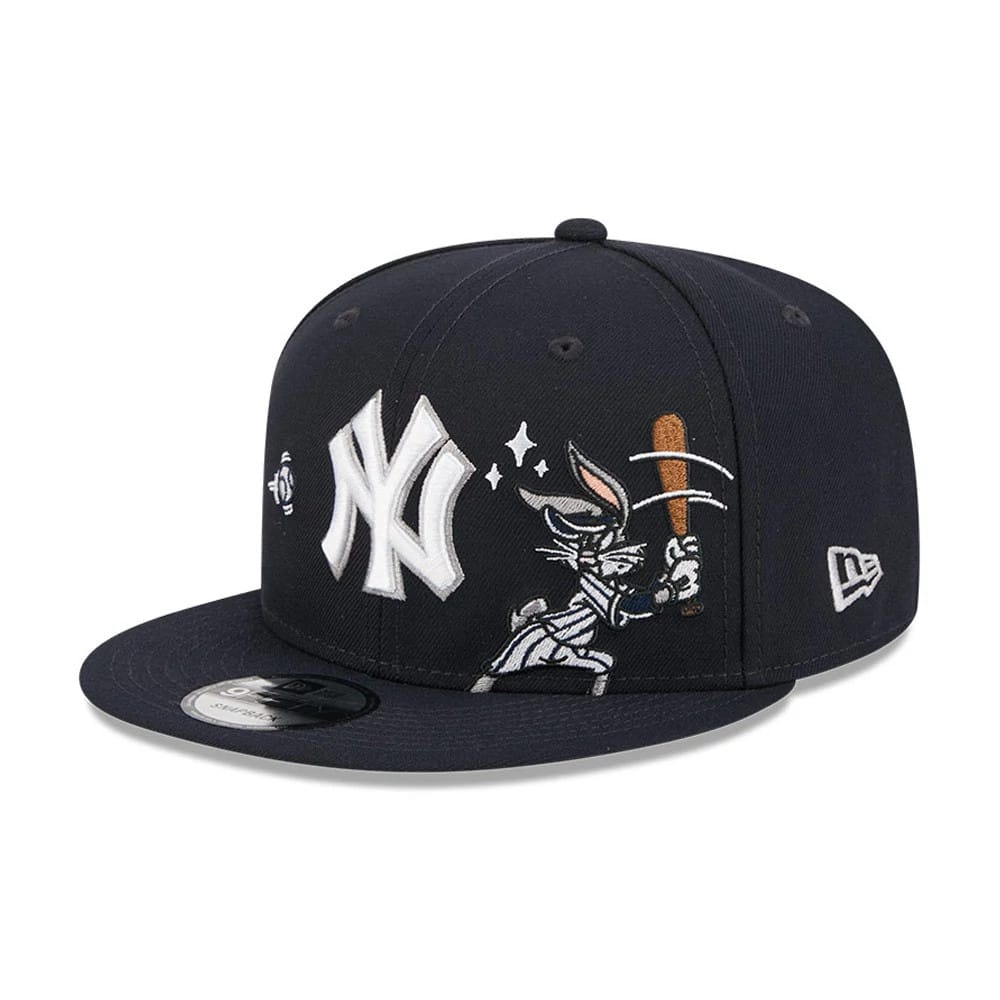 Pictured is this MLB X Looney Tunes Bugs Bunny New York Yankees 9FIFTY Snapback Adjustable cap in navy. 1