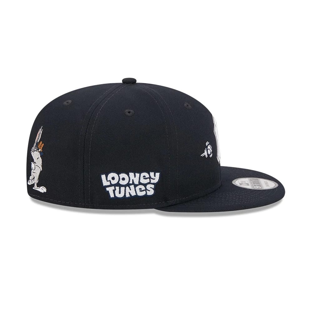Pictured is this MLB X Looney Tunes Bugs Bunny New York Yankees 9FIFTY Snapback Adjustable cap in navy. 6