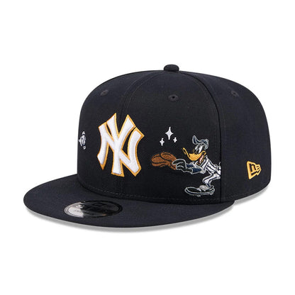 Pictured is this MLB X Looney Tunes Daffy Duck New York Yankees 9FIFTY Snapback Adjustable cap in navy. 1