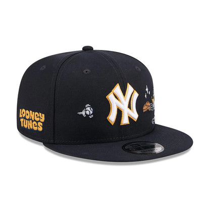 Pictured is this MLB X Looney Tunes Daffy Duck New York Yankees 9FIFTY Snapback Adjustable cap in navy. 4