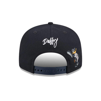Pictured is this MLB X Looney Tunes Daffy Duck New York Yankees 9FIFTY Snapback Adjustable cap in navy. 5