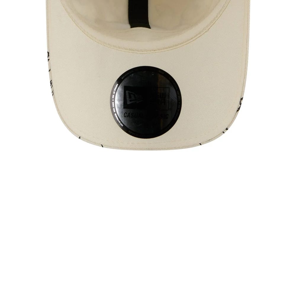Pictured is this MiLB X Looney Tunes Minor League Logo Casual Classic Adjustable cap in Cream. 2