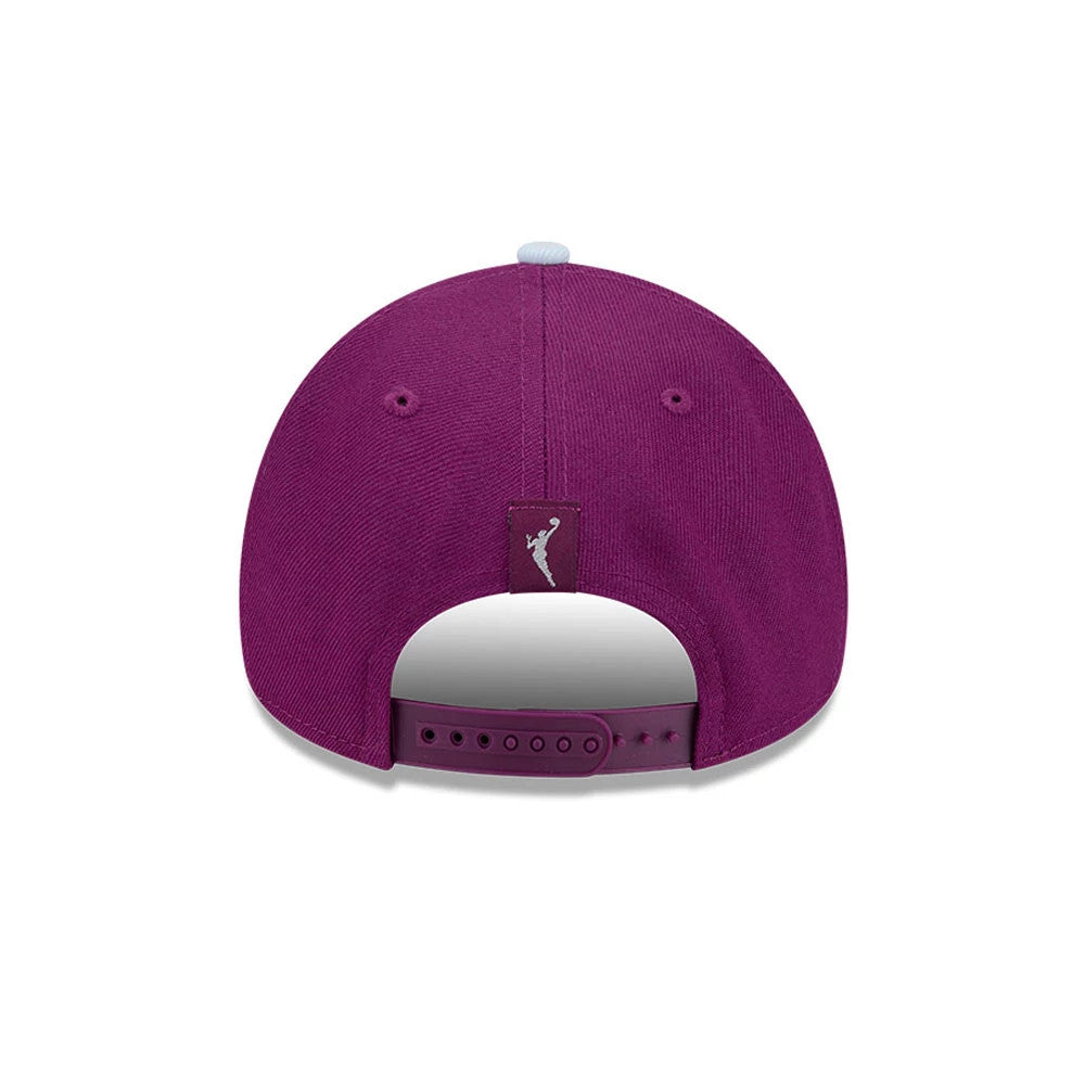 Toronto Tempo WNBA Tip Off 2026 Dark Red New Era 9FORTY A-Frame Adjustable Cap, rear view showing the white embroidered WNBA logo centred above the deep red adjustable strap, featuring a structured dark red crown and grey top button.