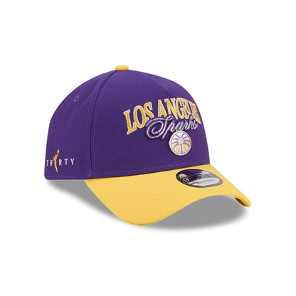 Pictured is this WNBA Tip Off 2026 LA Sparks 9FORTY A-Frame cap in purple. 3