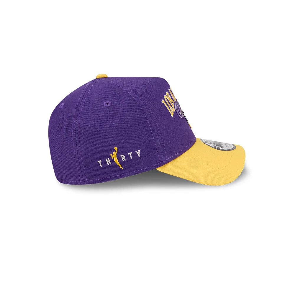 Pictured is this WNBA Tip Off 2026 LA Sparks 9FORTY A-Frame cap in purple. 5