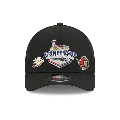 Pictured is this NHL Stanley Cup Champions Anaheim Ducks 9FORTY M-Crown A-Frame Trucker Adjustable cap in black. 3