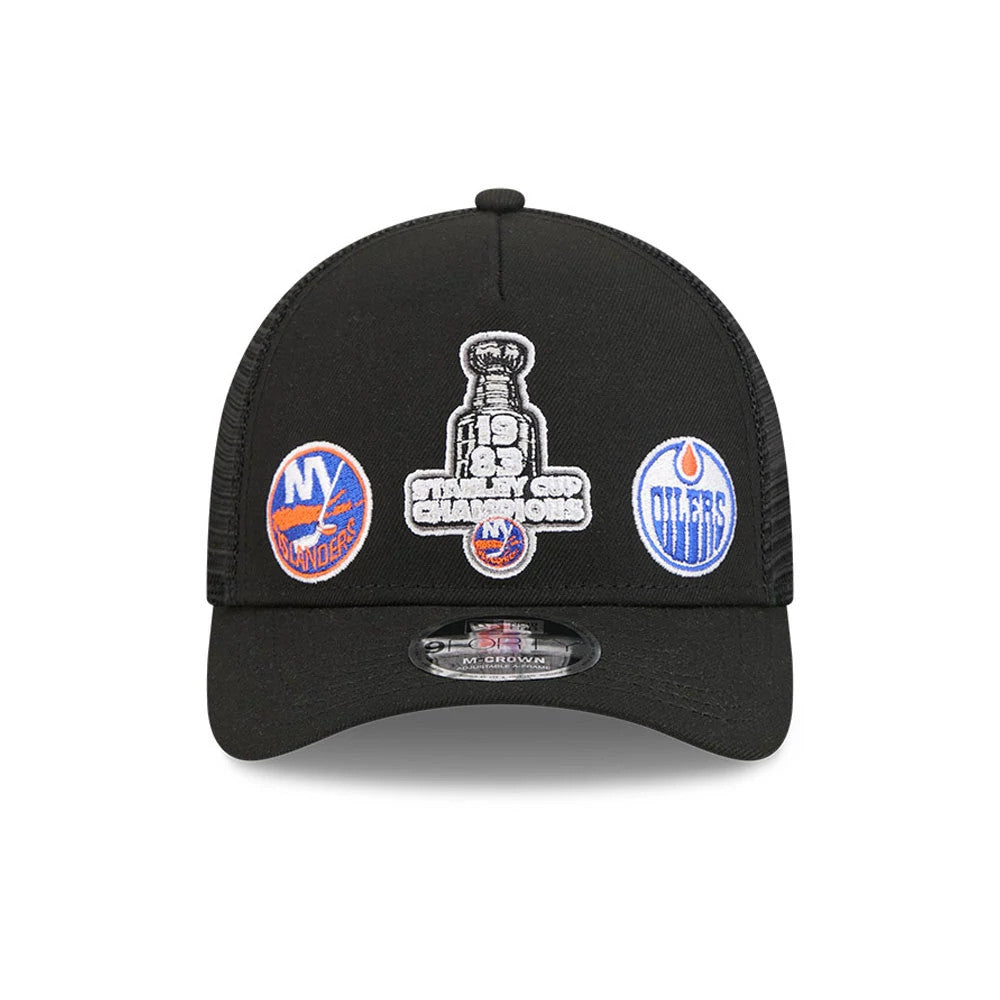 Islanders NHL Stanley Cup Black New Era 9FORTY M-Crown A-Frame Trucker Adjustable Cap, front view showing the embroidered 1983 Stanley Cup Champions trophy graphic on the structured black front panel with Islanders.